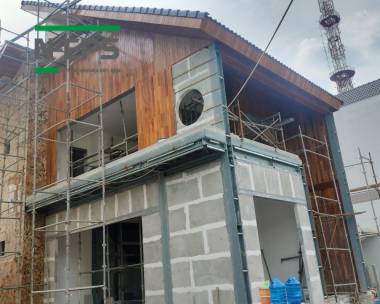 Nhà thép tường bê tông nhẹ ốp gỗ căm se