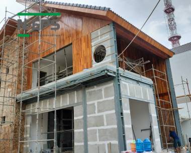 Nhà thép tường bê tông nhẹ ốp gỗ căm se